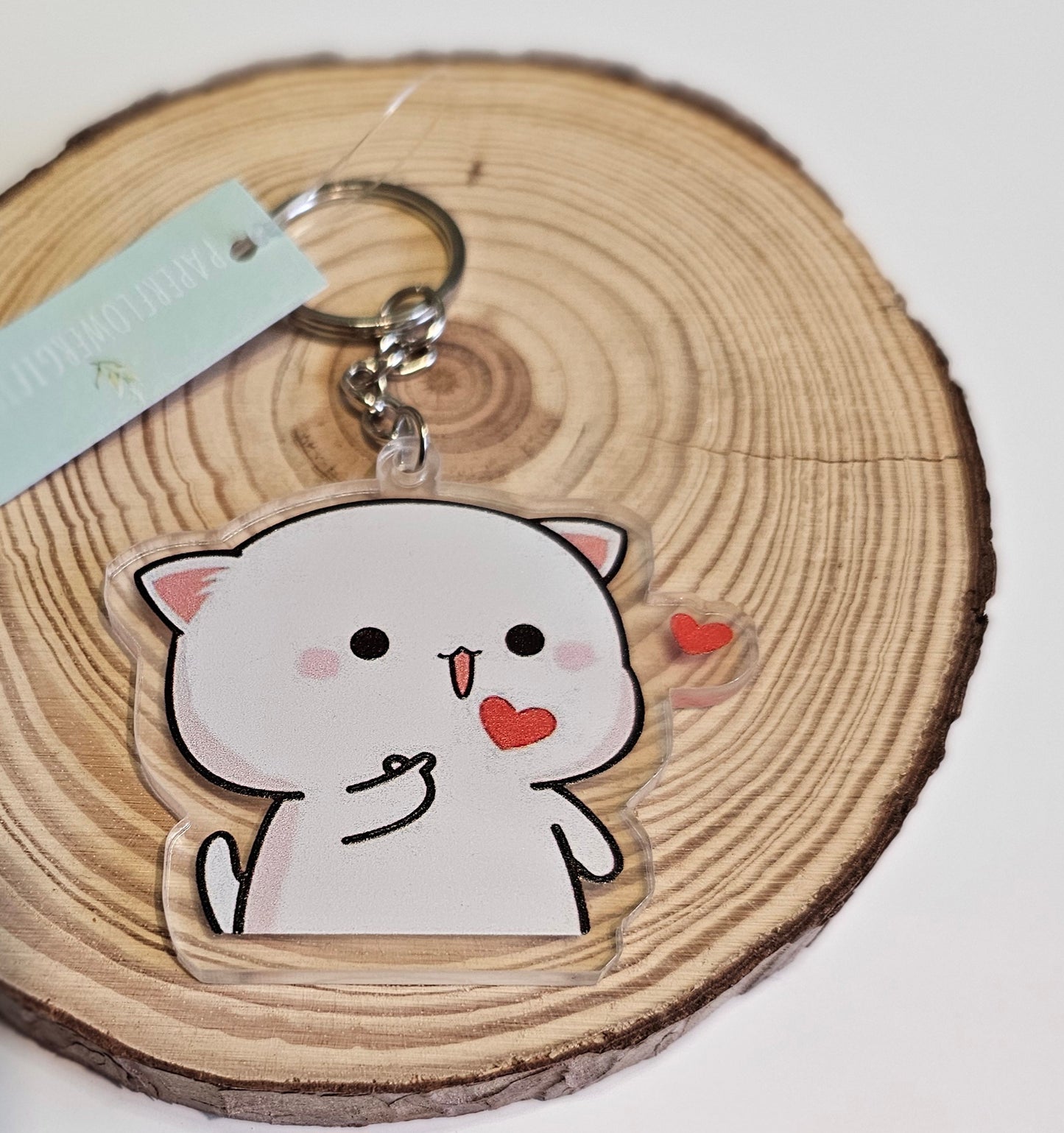 White cat kisses key rings