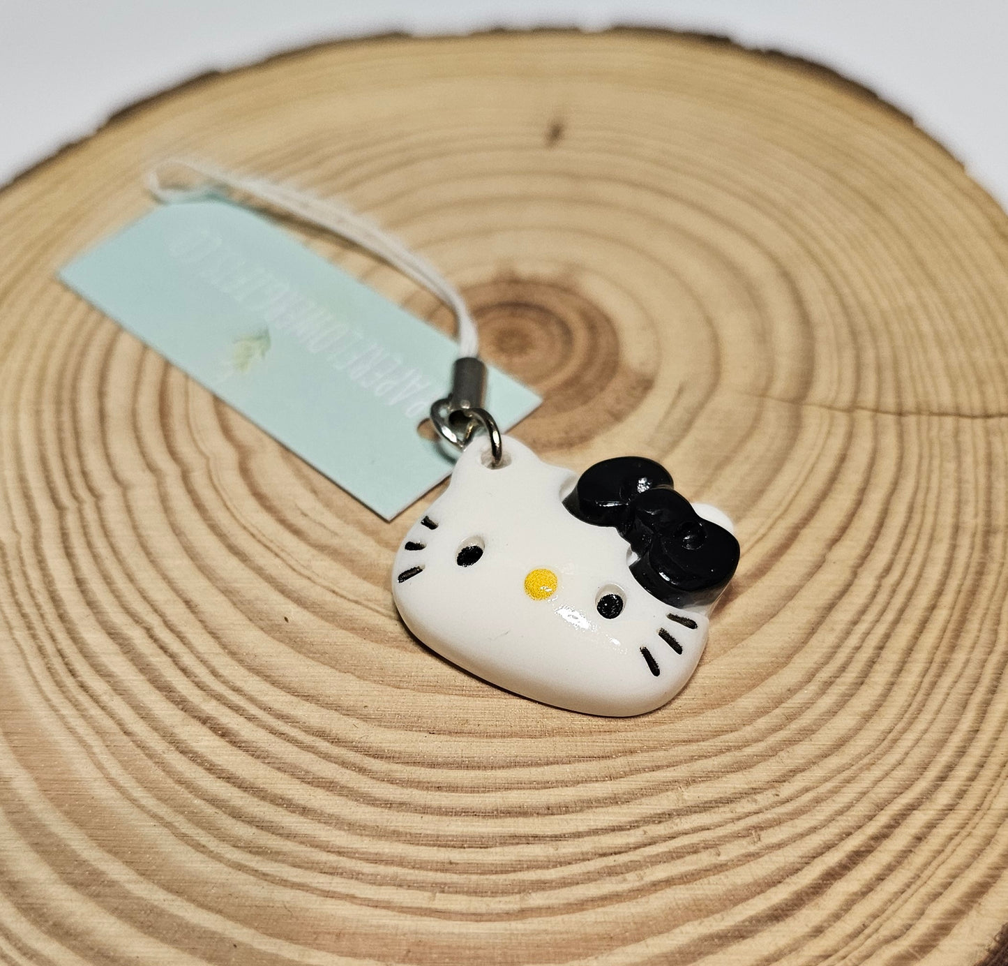 White & black bow hello kitty phone charm