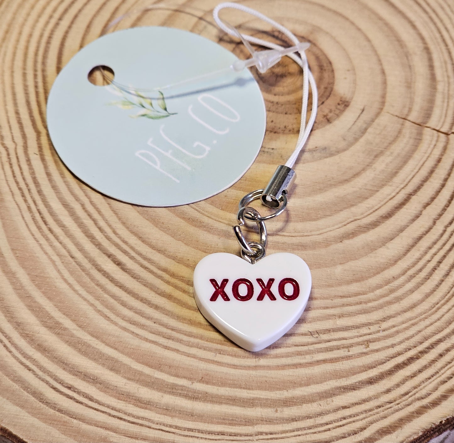 White xoxo heart phone charms