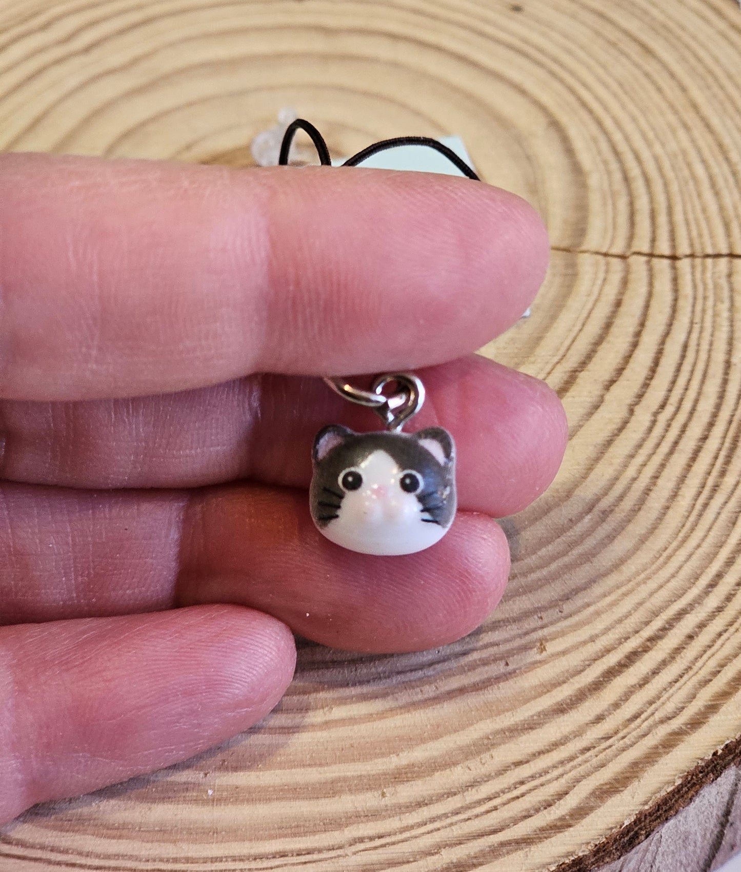 Tiny cat face phone charm