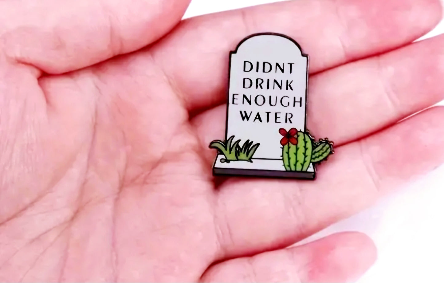 Grave pin badge