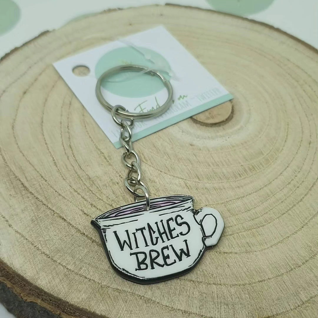 White witches cauldron key rings