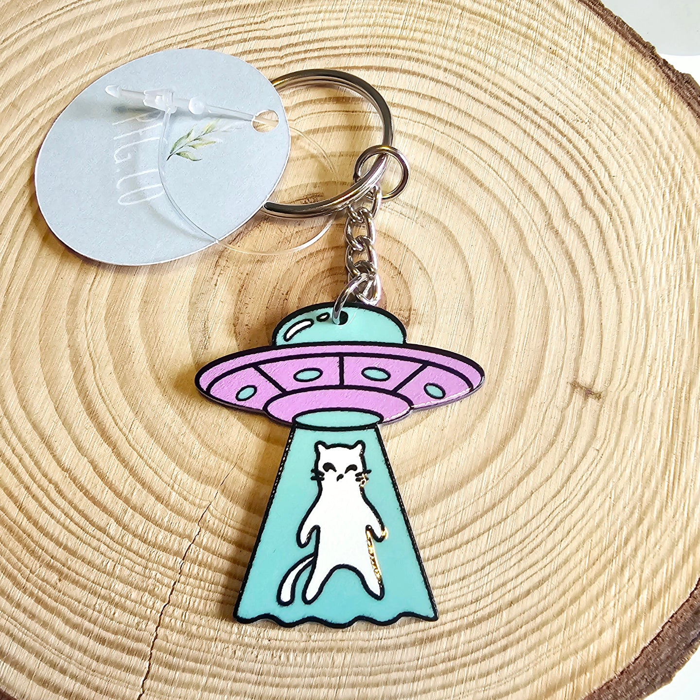 Cat in spaceship key ring