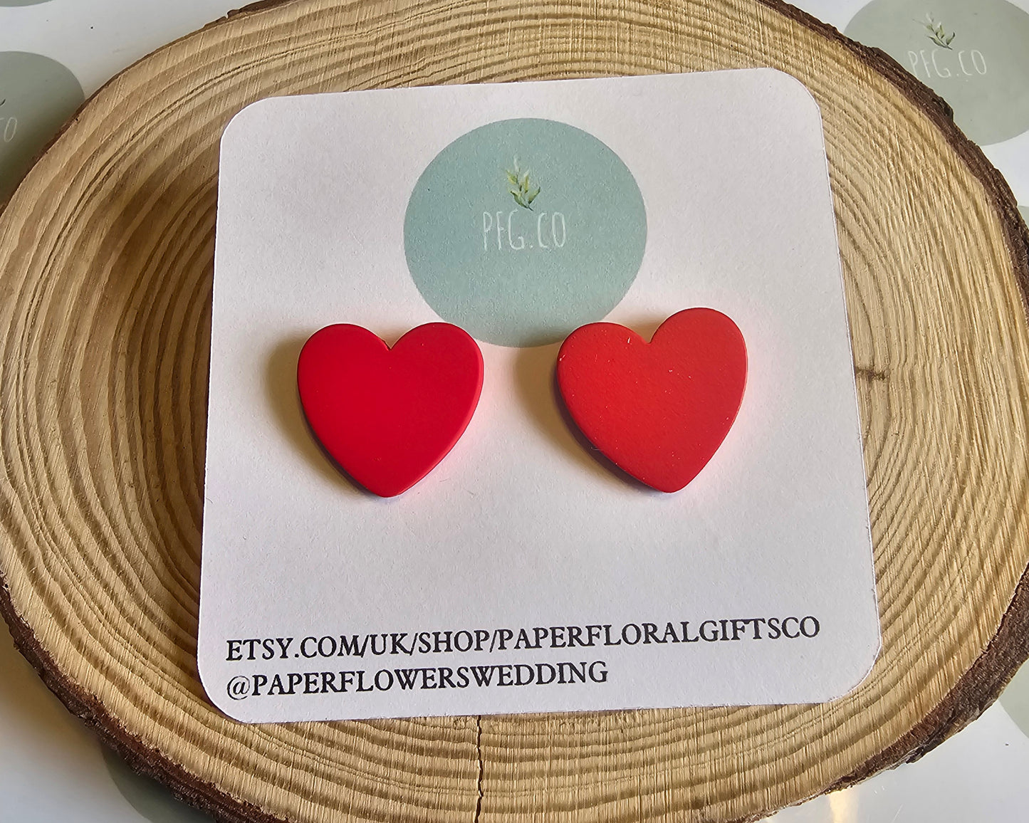 Red heart stud earrings