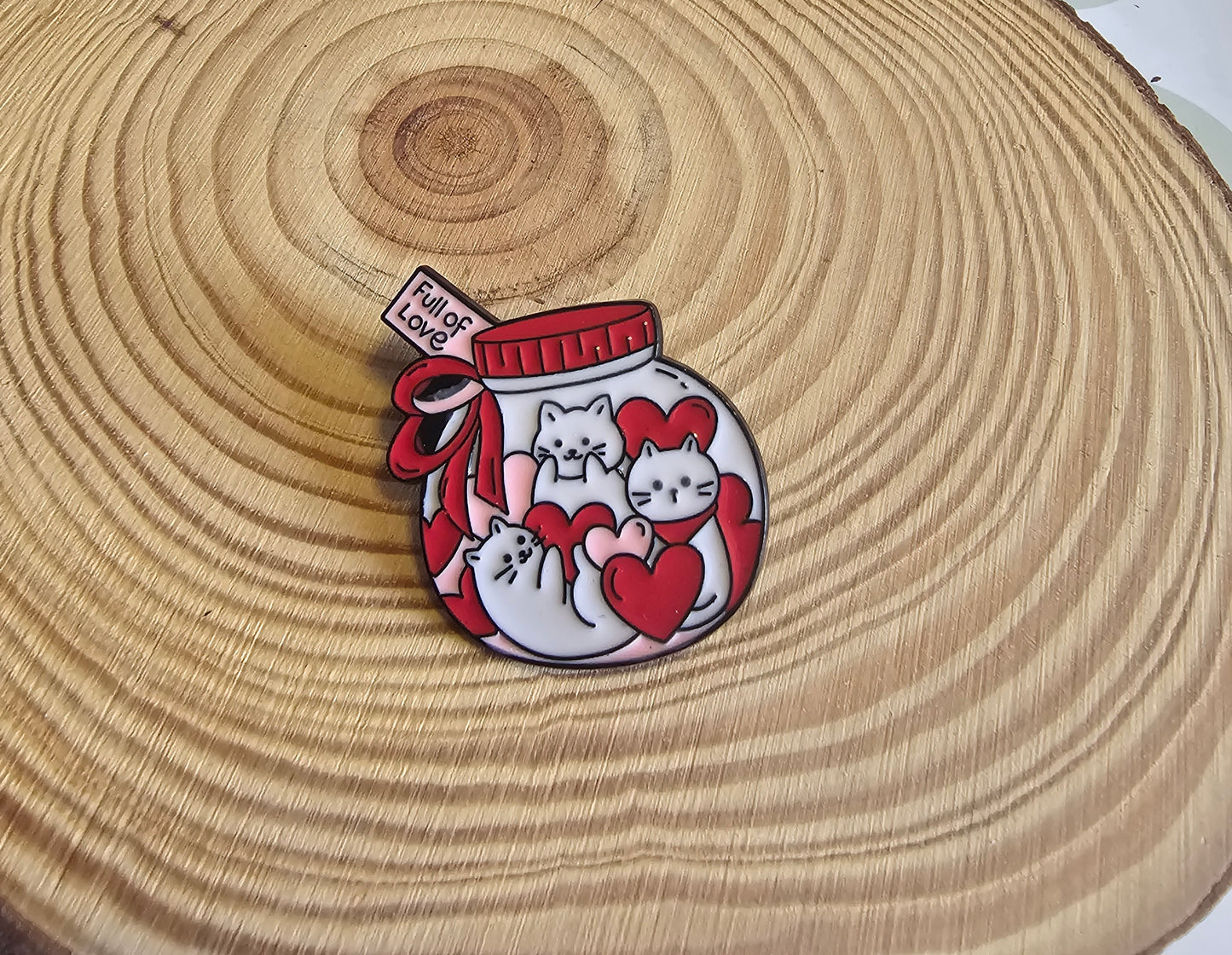 Jar of cats pin badges