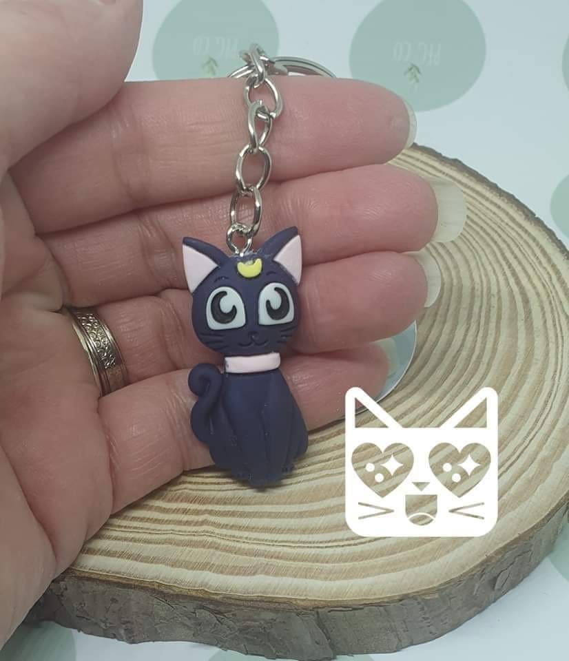 Cute black and pink cat key rings